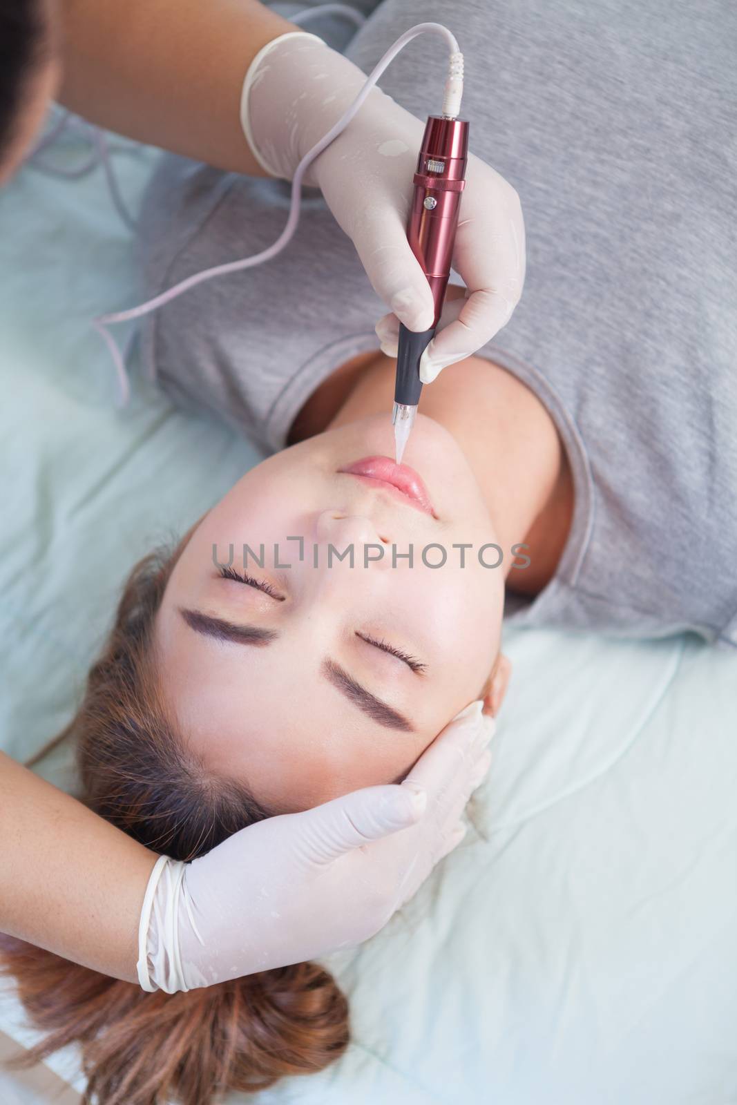 Professional permanent makeup applying by witthaya
