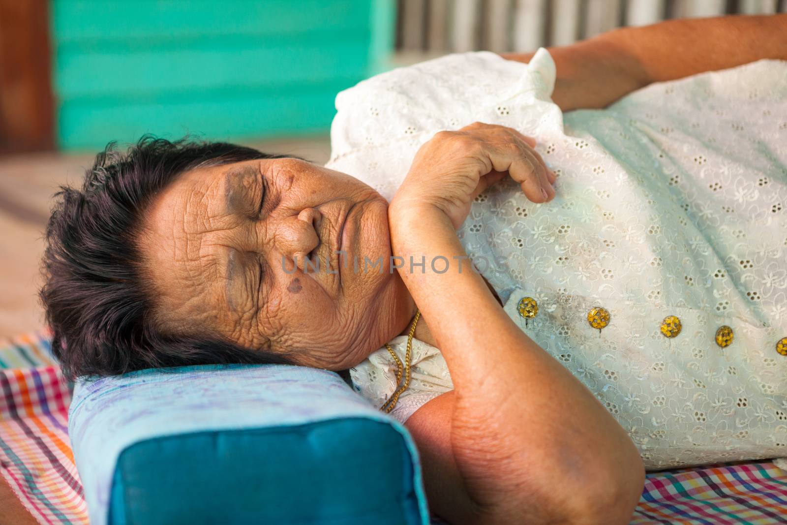 Asian senior woman sleeping in the house by witthaya