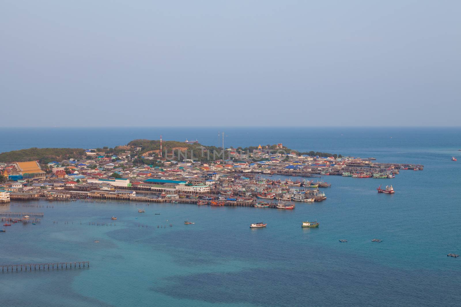 Aerial view of fishermen town on sunset by witthaya
