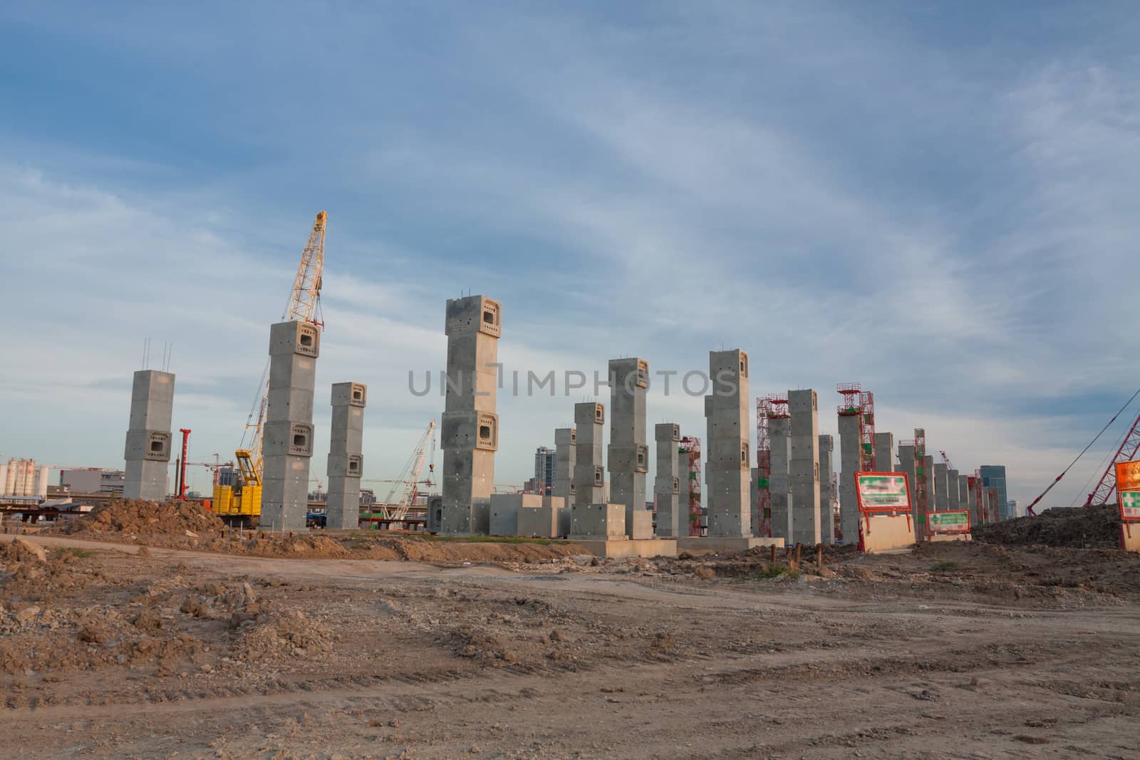 The construction site. Construction of the new building. Construction cranes.