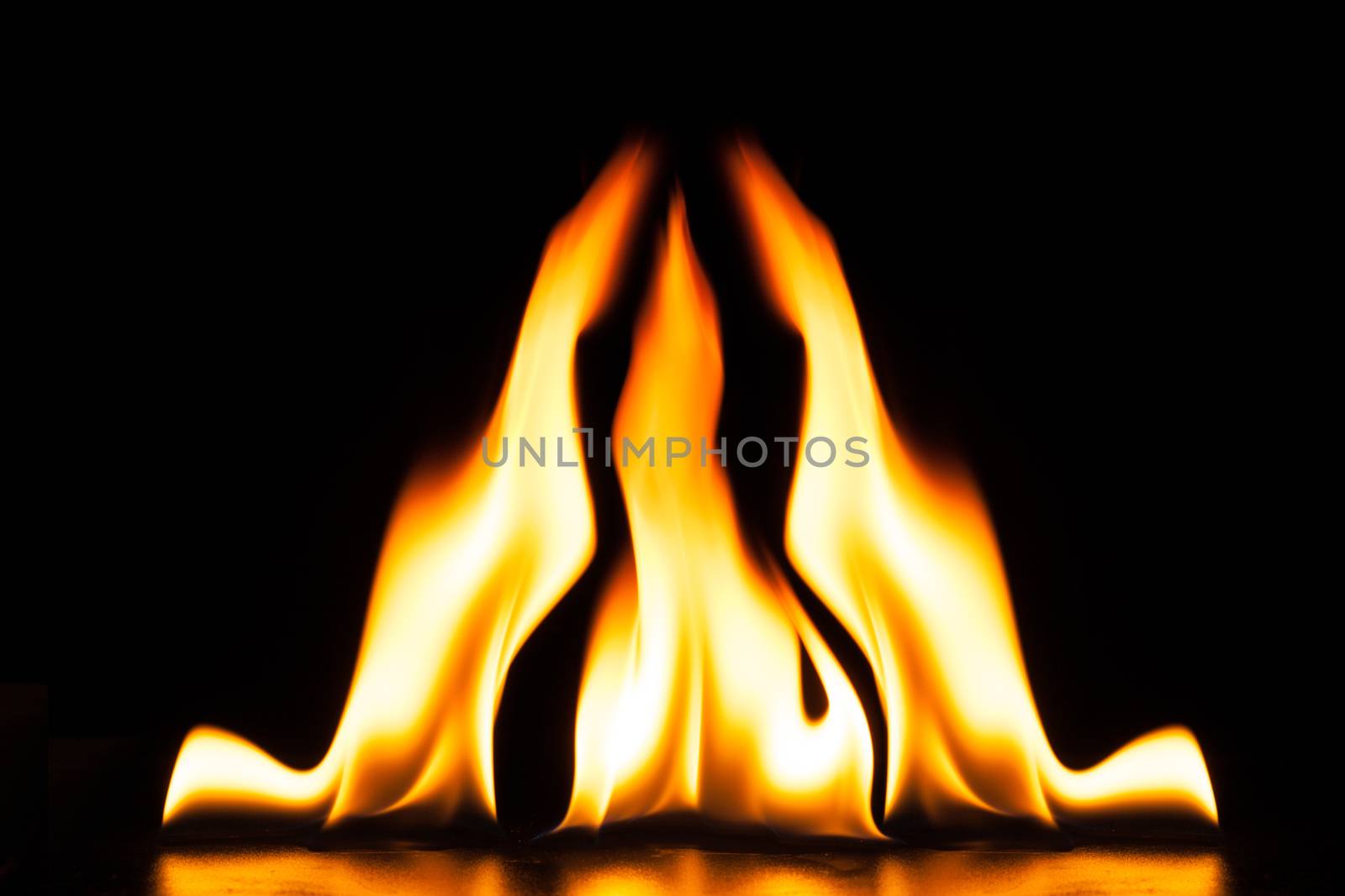 Burning fire flame on black background by nopparats
