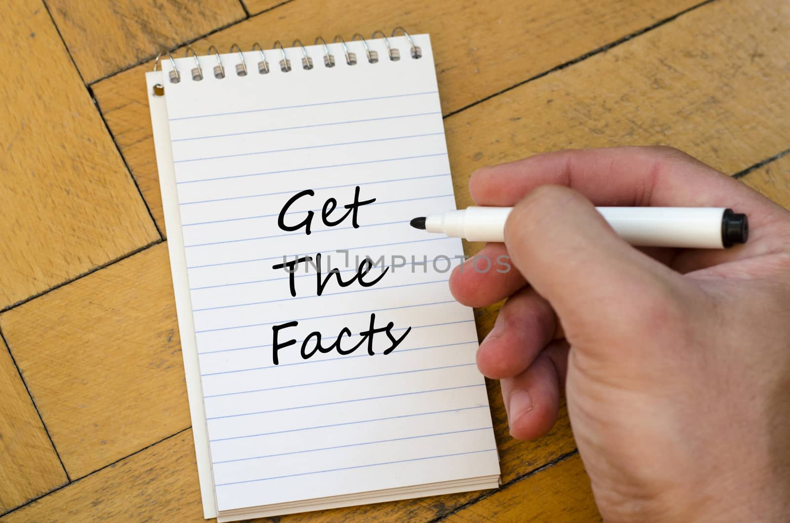 Get the facts text concept write on notebook
