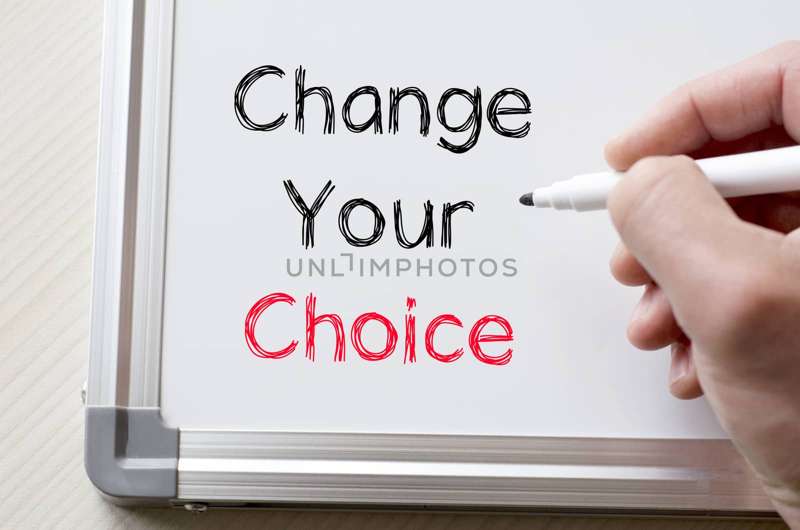 Human hand writing change your choice on whiteboard