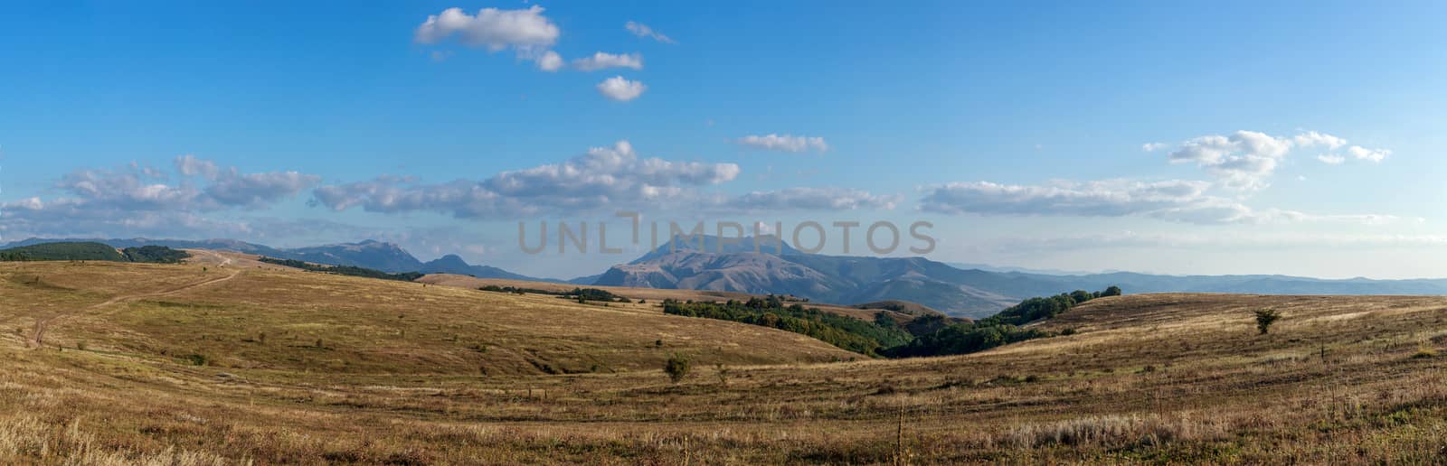 Mountain plateau in the background of the cloudy sky by fogen