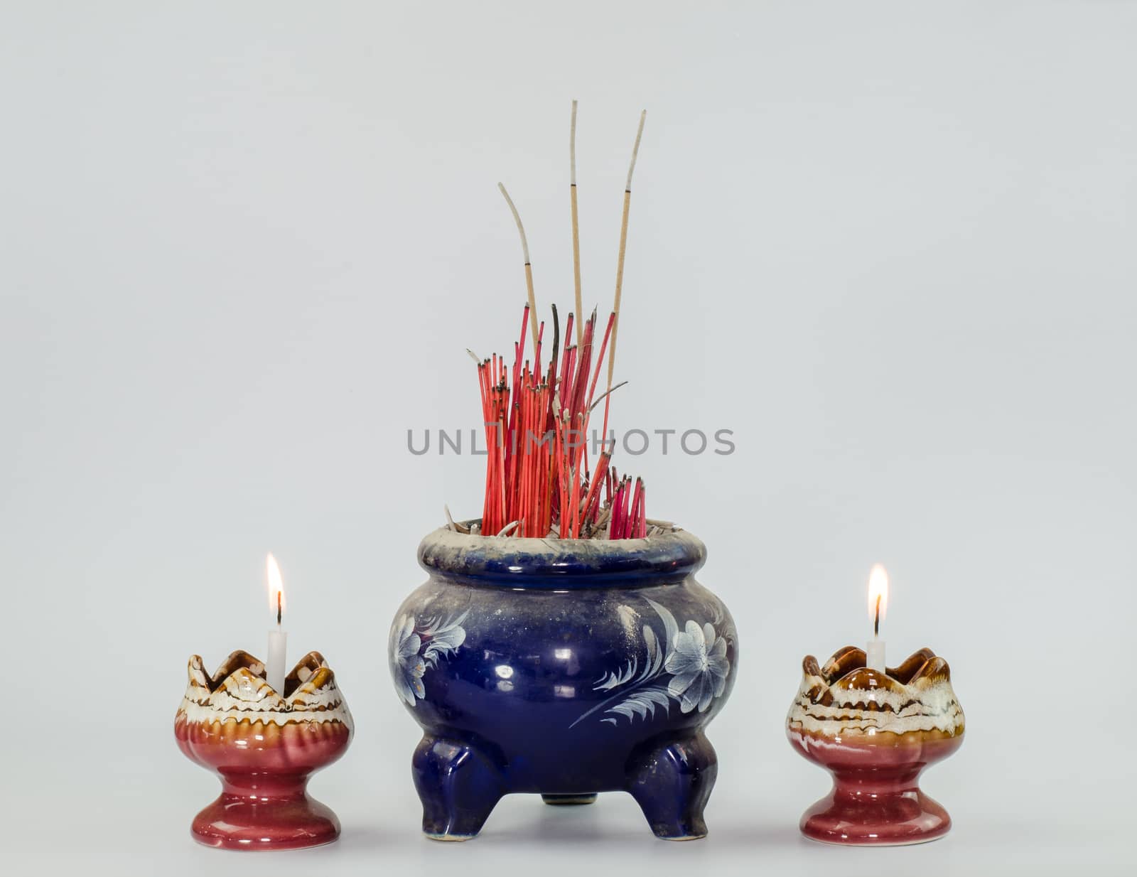 Incense burner and fire  on white background