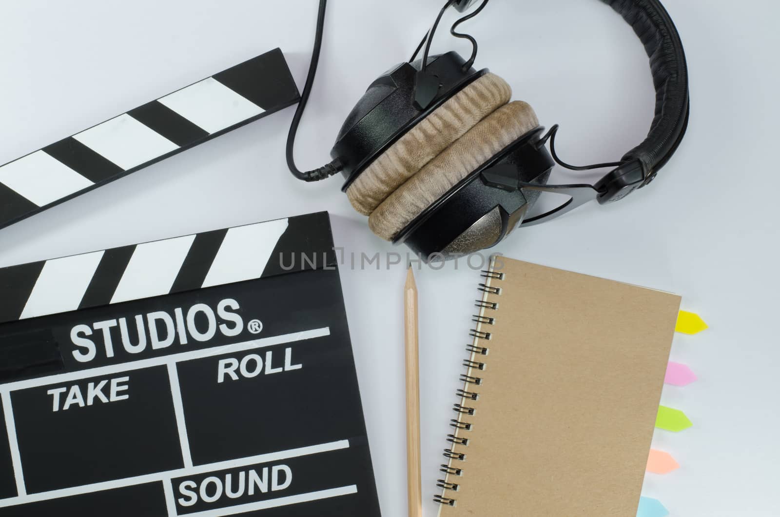 Slate film and notebook headphone white background by metal22