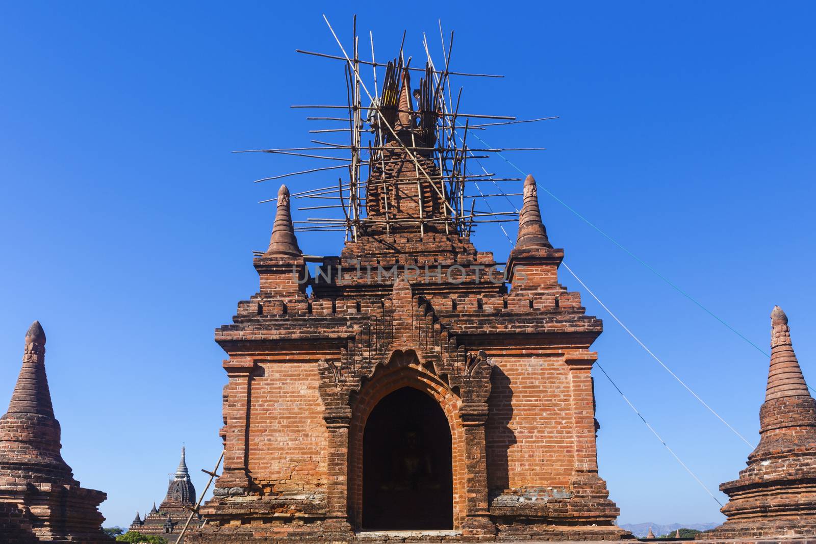 Bagan buddha tower at day by cozyta