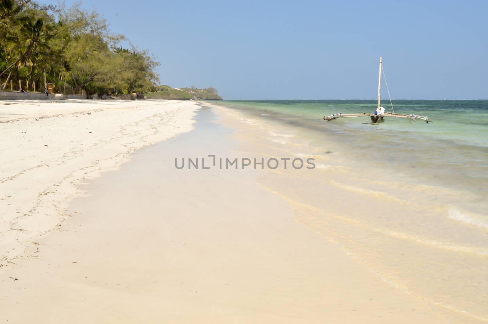 Bamburi sandy beach with a ditch near Mombasa in Kenya