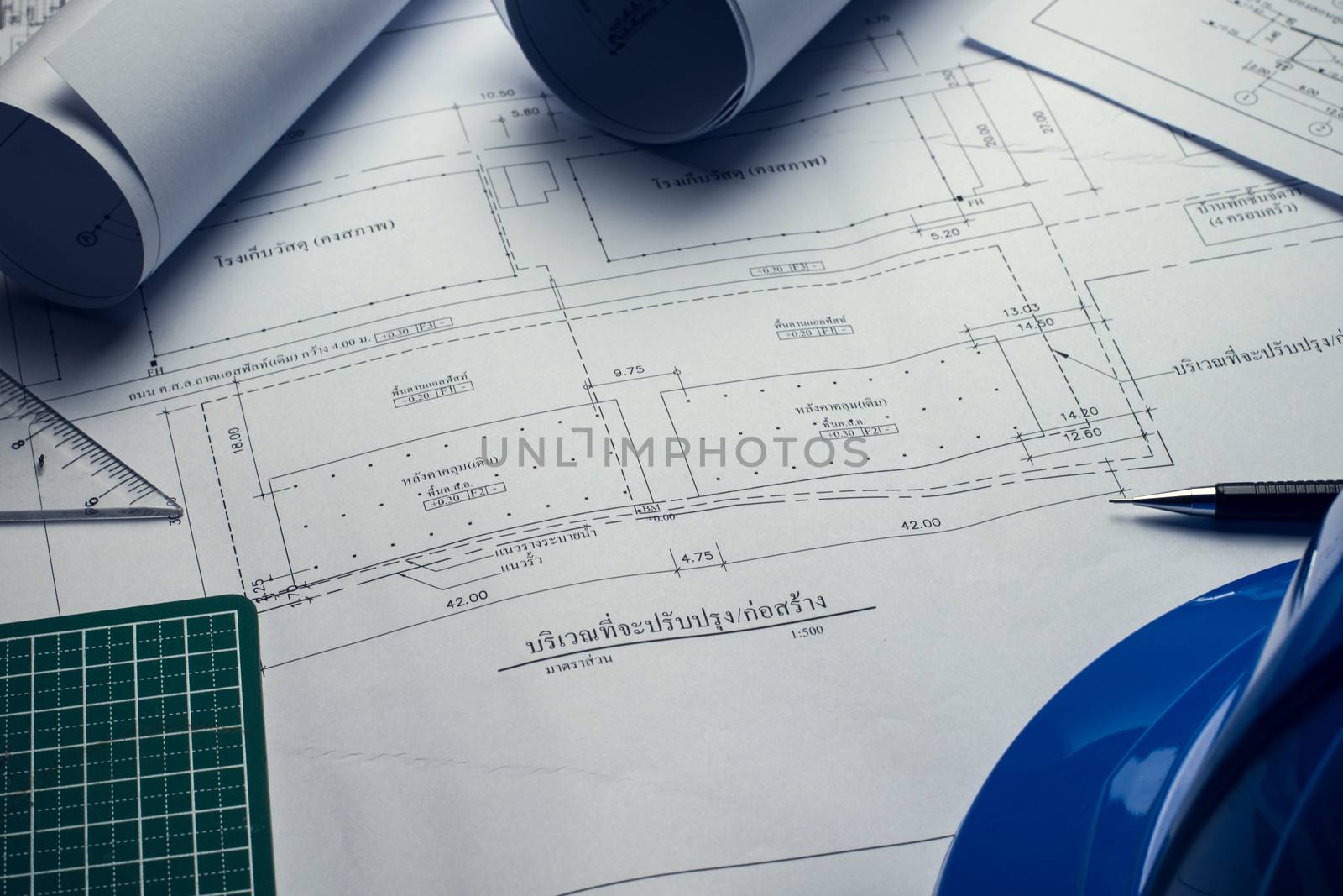 Engineering diagram blueprint paper drafting project sketch architectural,selective focus