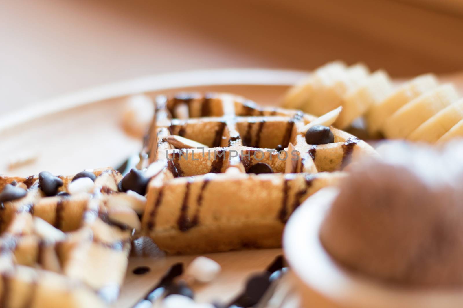 Belgian waffles with fruit and chocolate, forest fruit, all homemade, delicious batter.