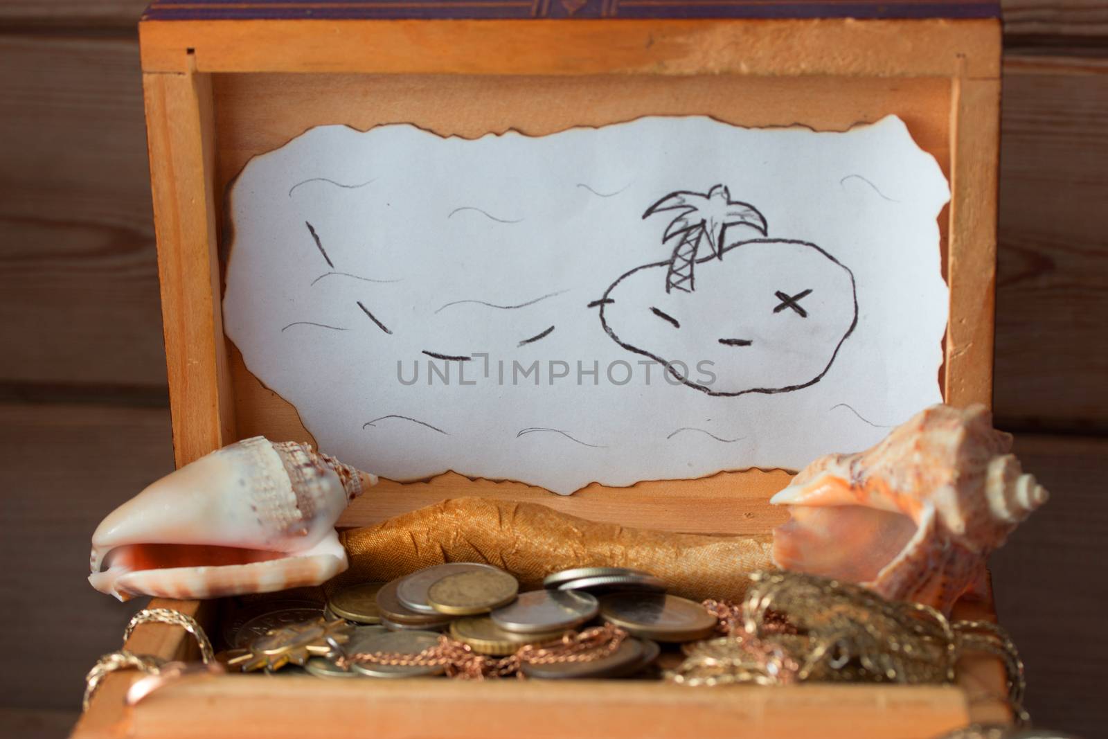 Still life with treasures, cards, candlestick on a dark background