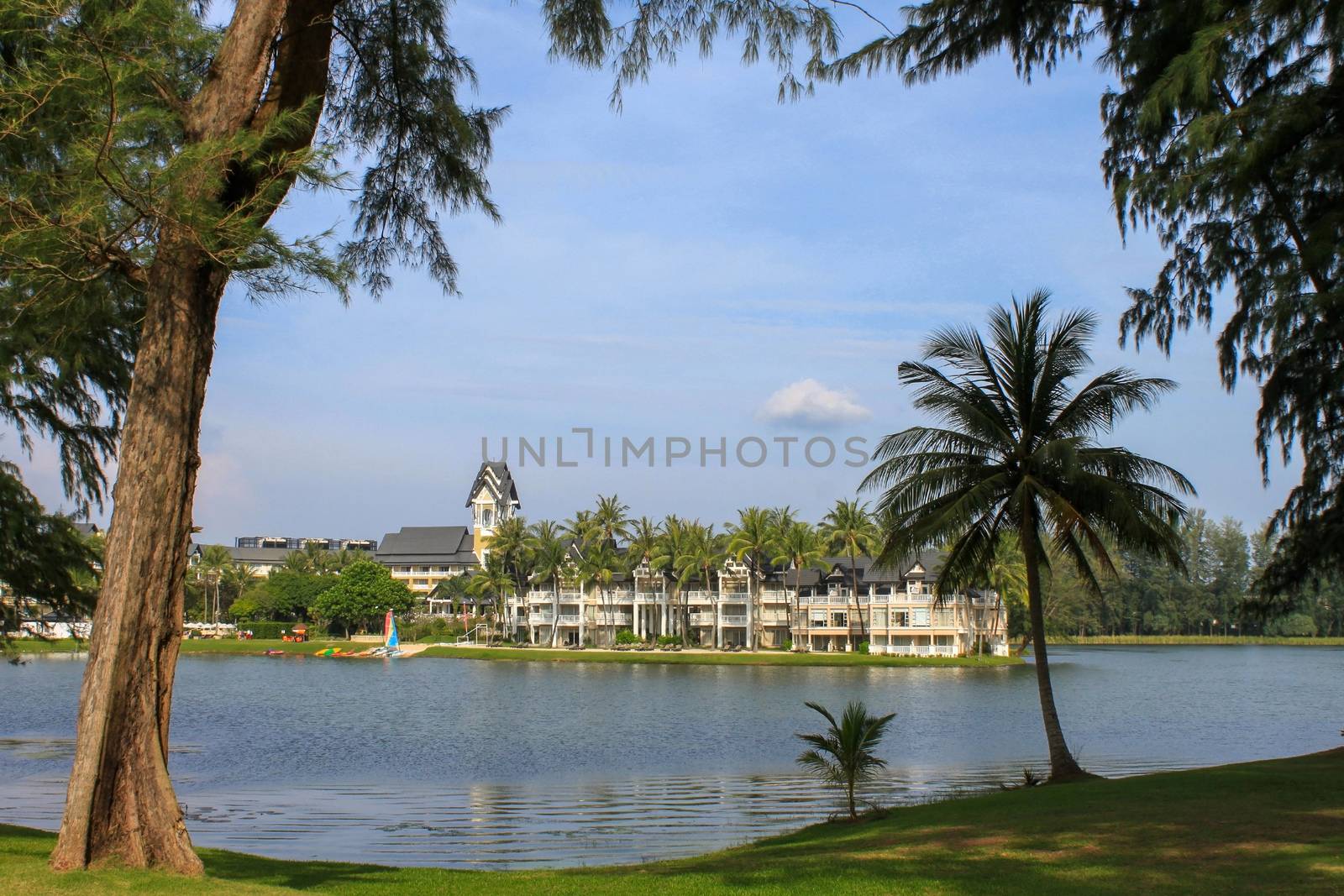 Laguna Beach Resort,PHUKET, THAILAND - NOV, 06, 2013: Luxury villa with lagoon lake and palm around, by evolutionnow