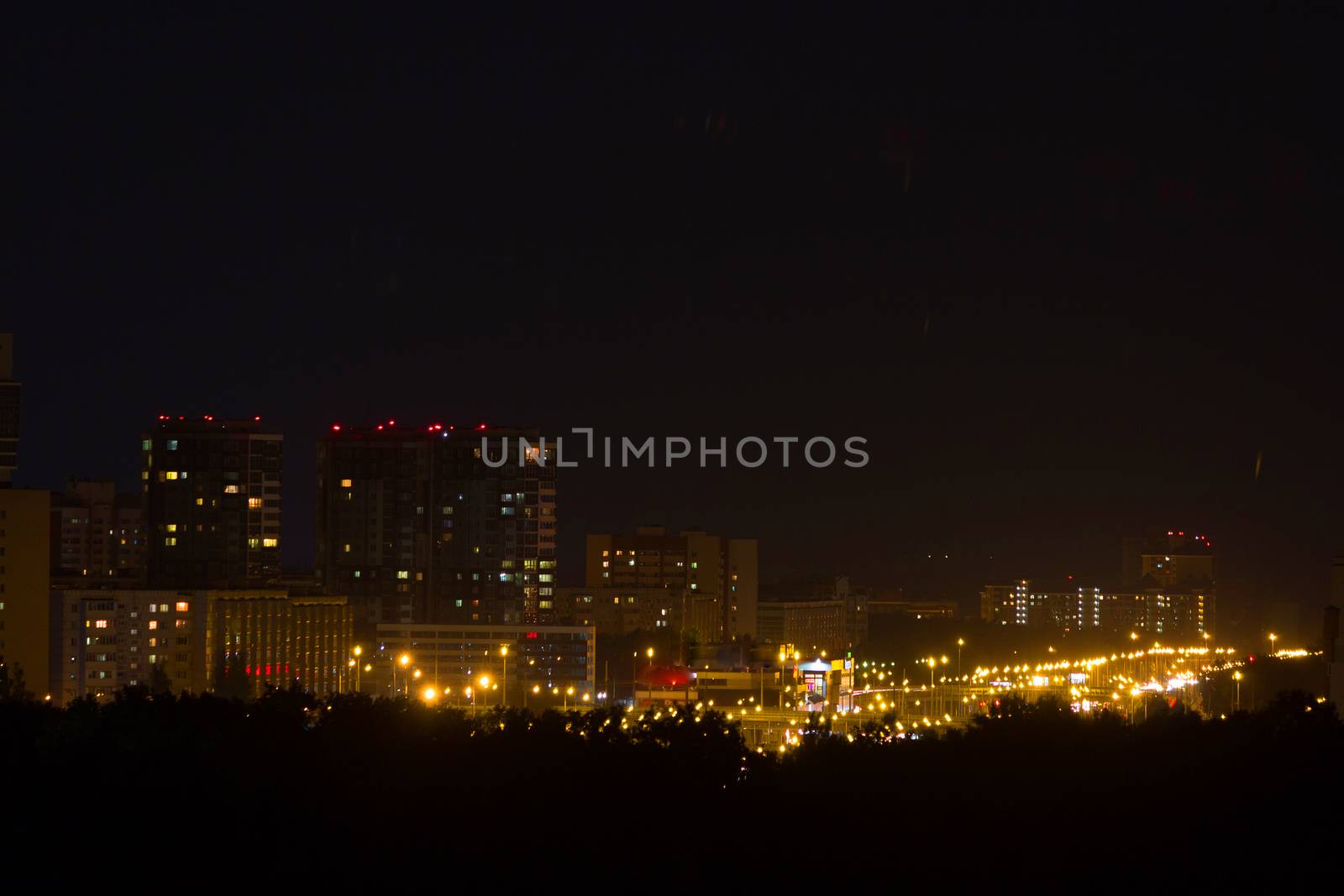 night city view. yellow illumination and skyscapers