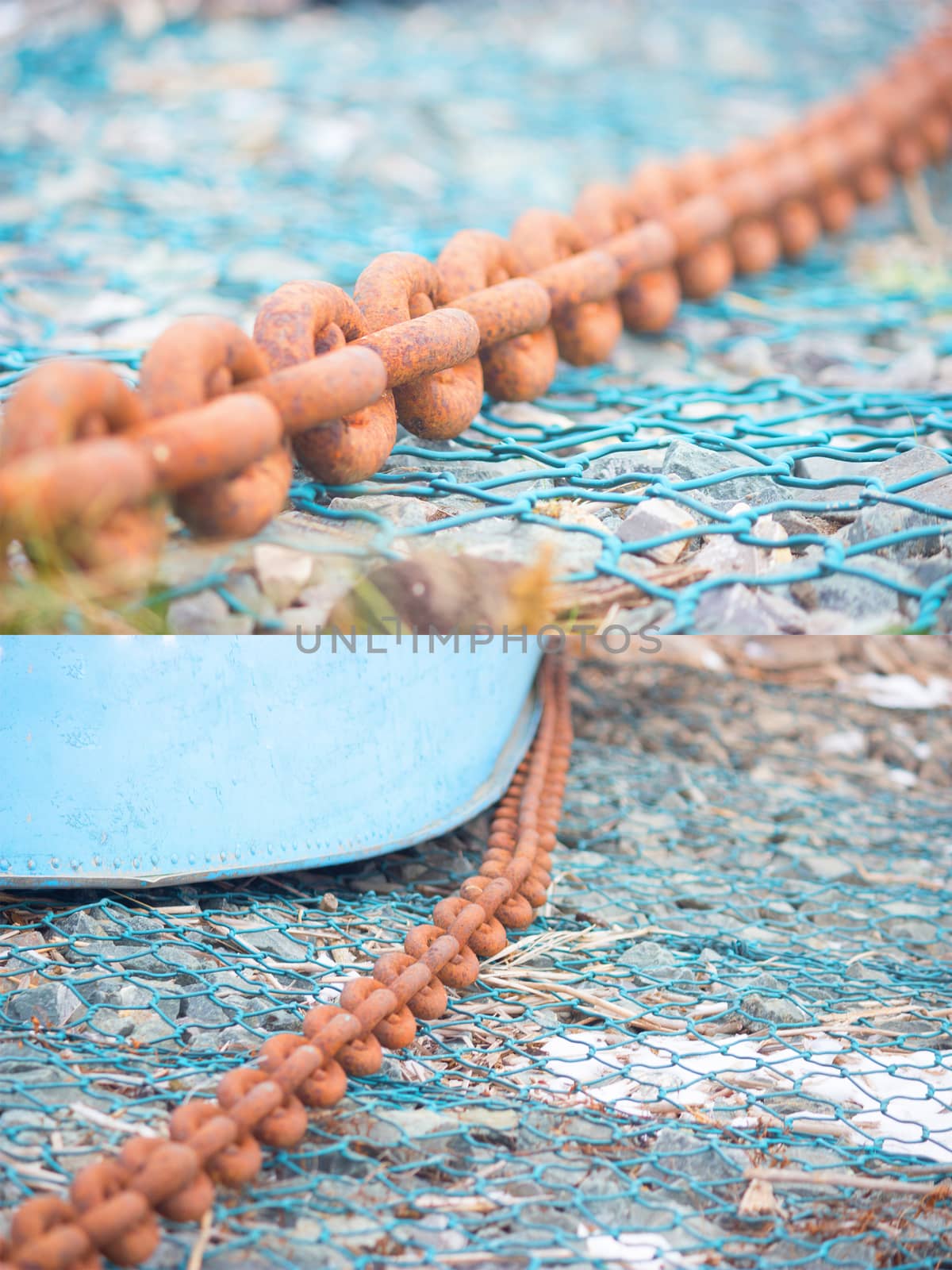 old rusty boat chain on blue background