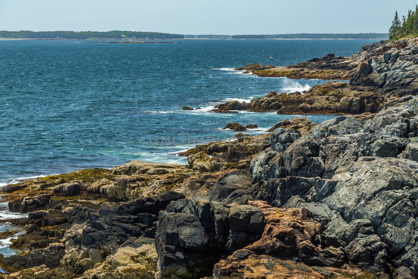 Maine’s rocky, forest-lined coast has more shoreline than California, with inlets, bays and coves lapped by frigid Atlantic waters, even in the warmest of summers. Nearly 60 percent of Maine’s coastline is composed of hard rock.