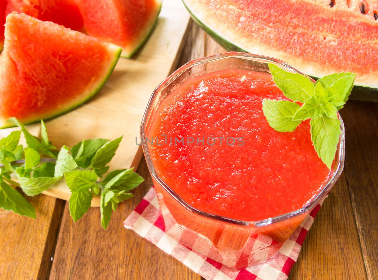 Watermelon juice with sliced fruit