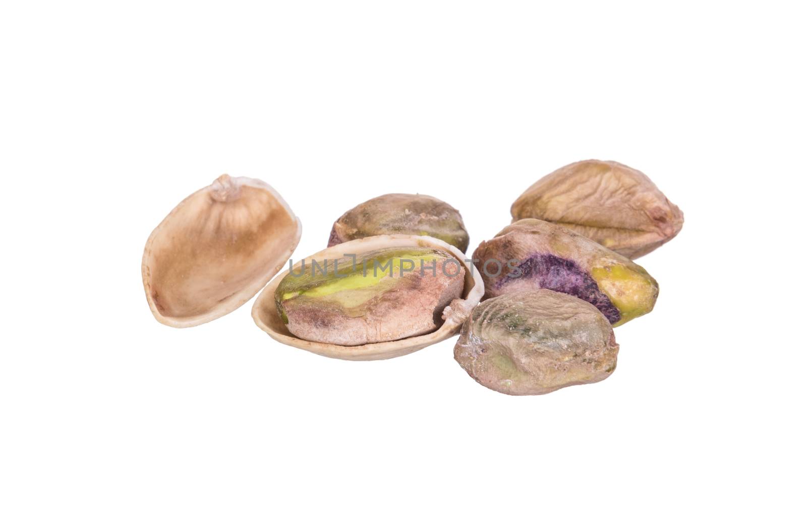 Pistachio nuts isolated on a white background.