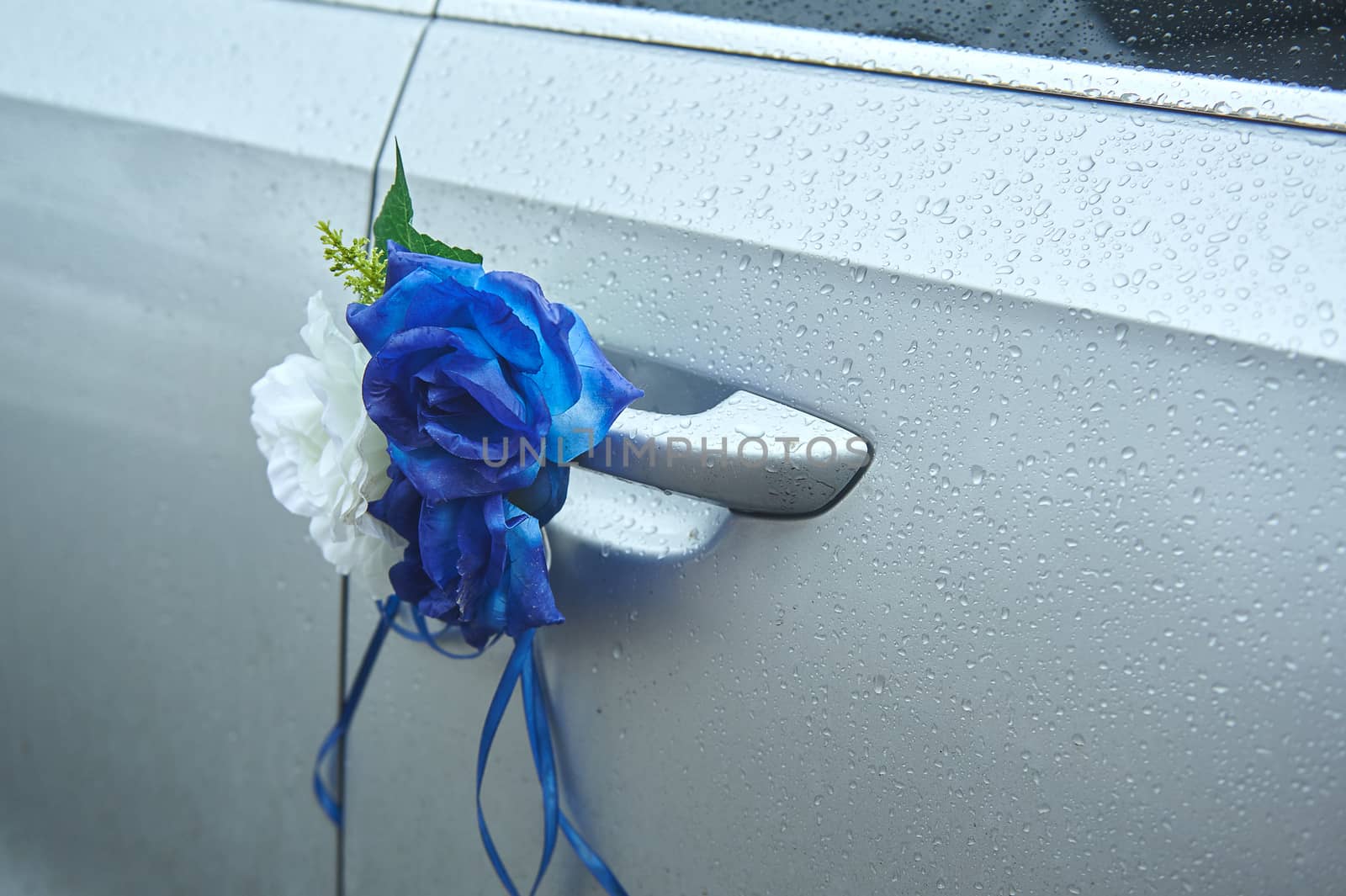Flower decorations on the wedding car handle by timonko
