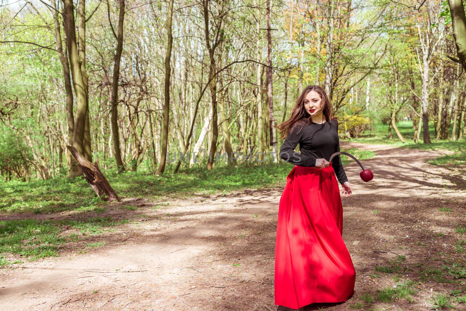 woman with a sickle in forest by okskukuruza