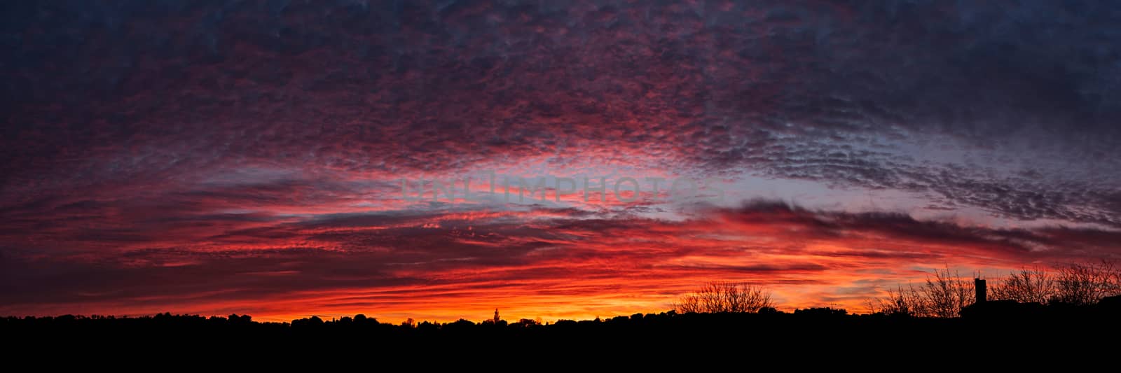 Wonderful panoramic colorful sunset by LuigiMorbidelli