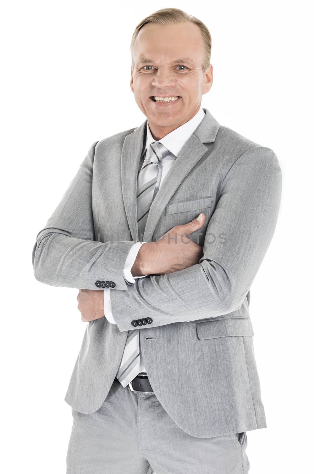 Portrait of smiling mature businessman wearing gray suit isolated on white background