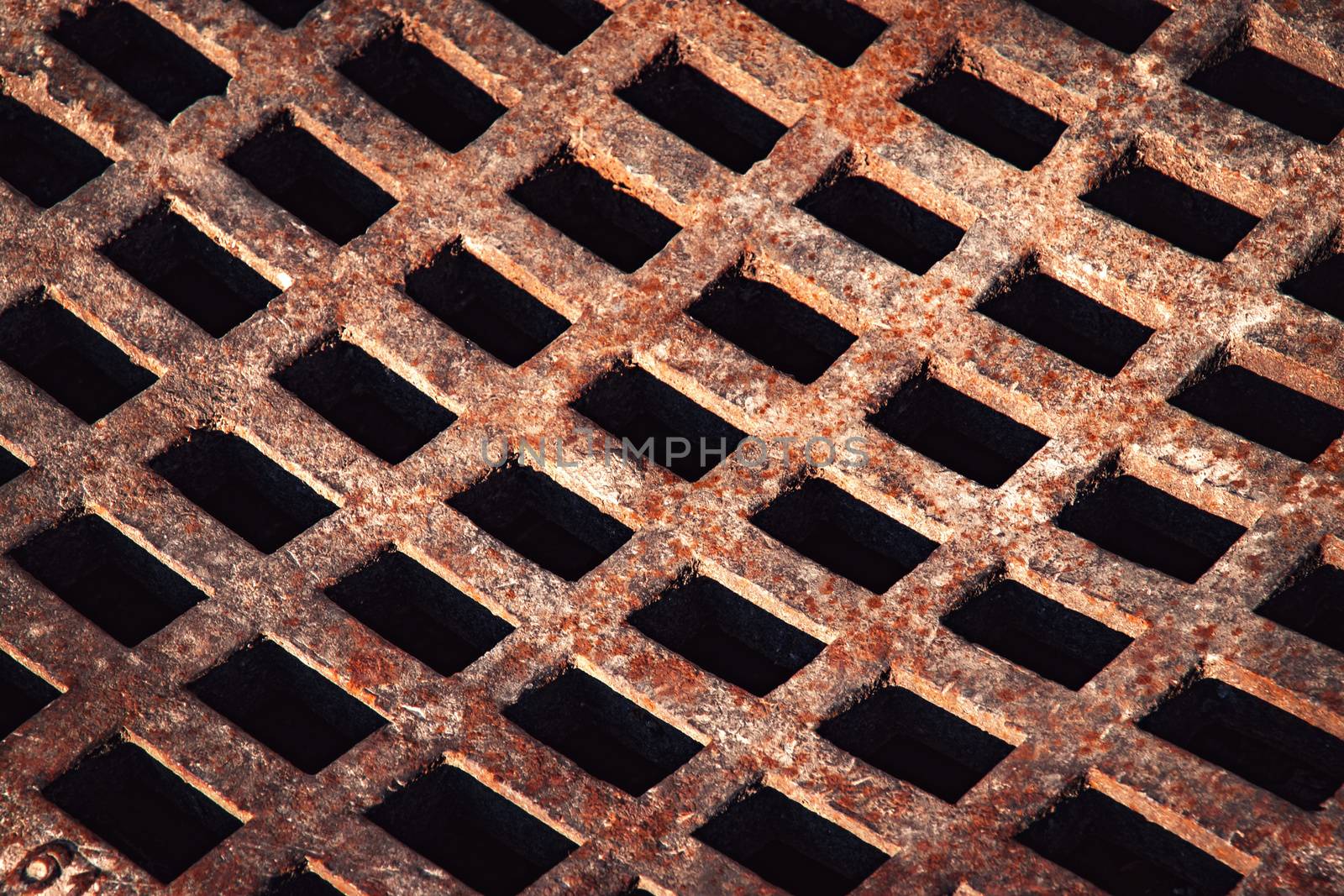 background rusty iron grid to sewerage