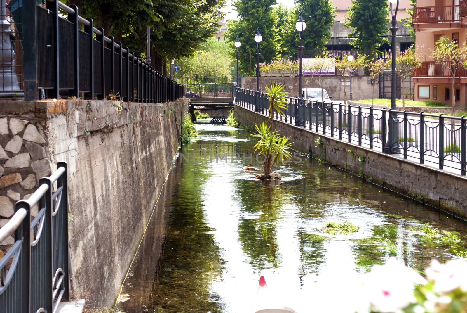 City landscape with a small river.   City of Scafati, Italy. Architecture of a small southern Italian town.                                                                                                                                                                                