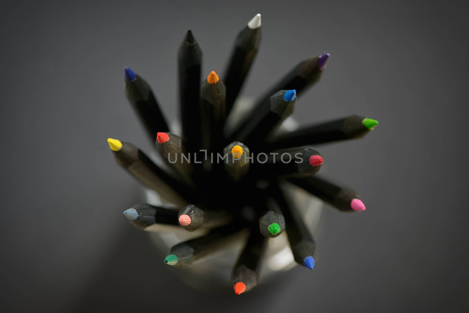 Colored  black pencils in jar