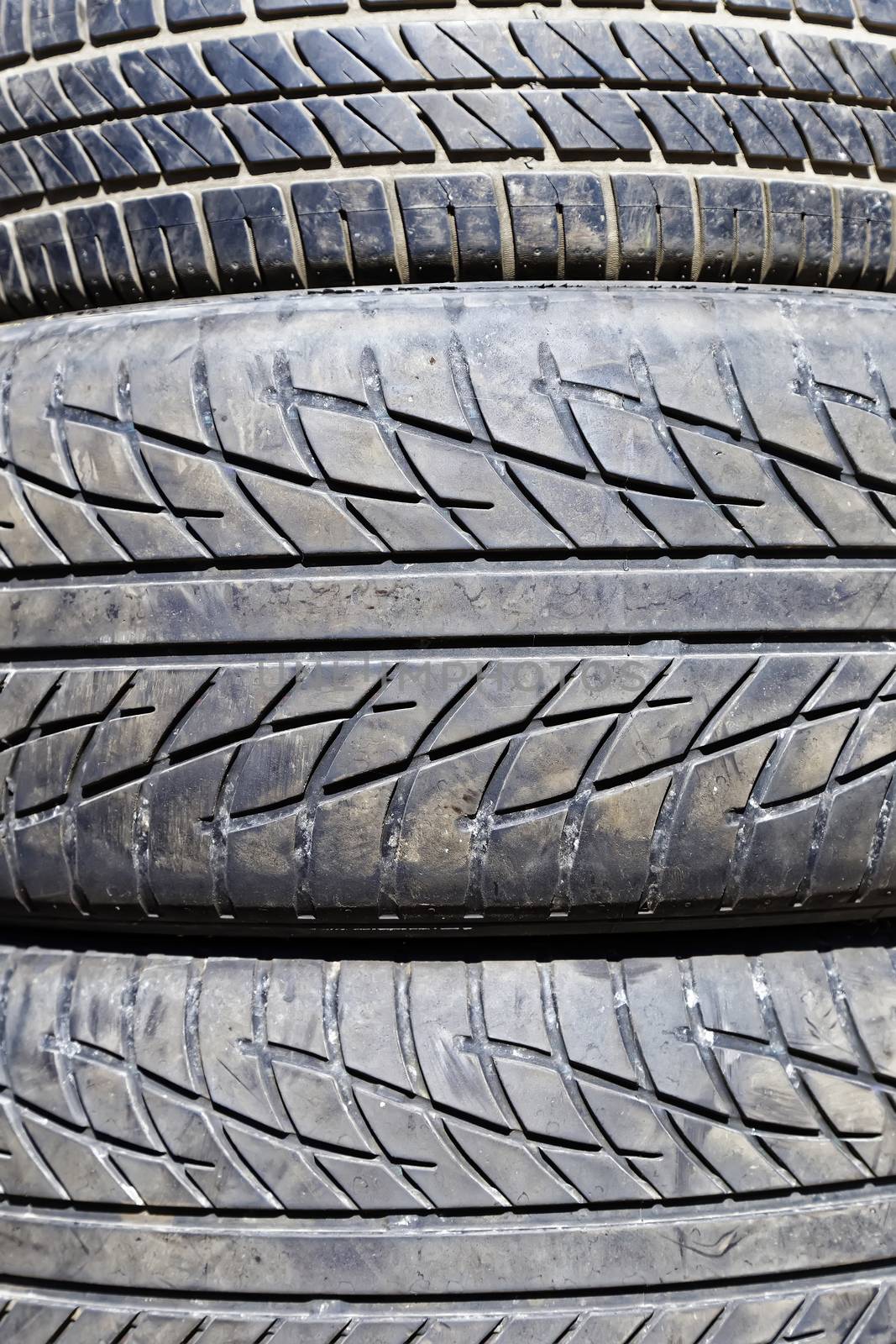 stack of used car tires