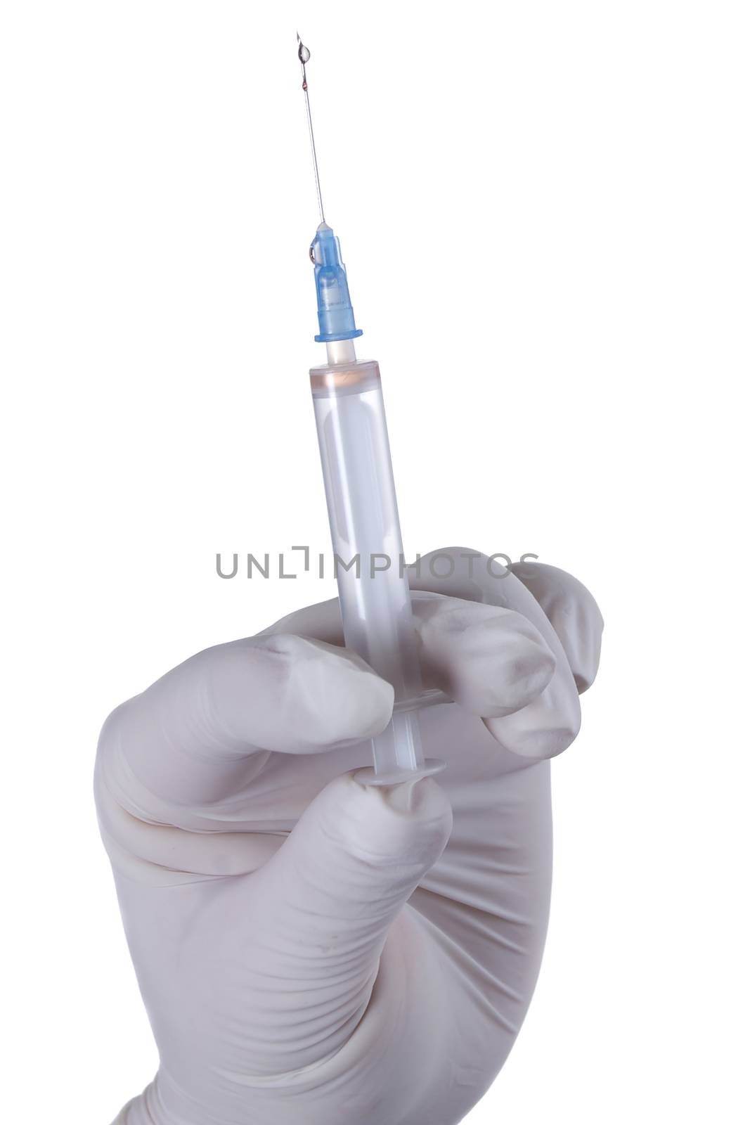 Hand in latex glove with syringe by VIPDesignUSA