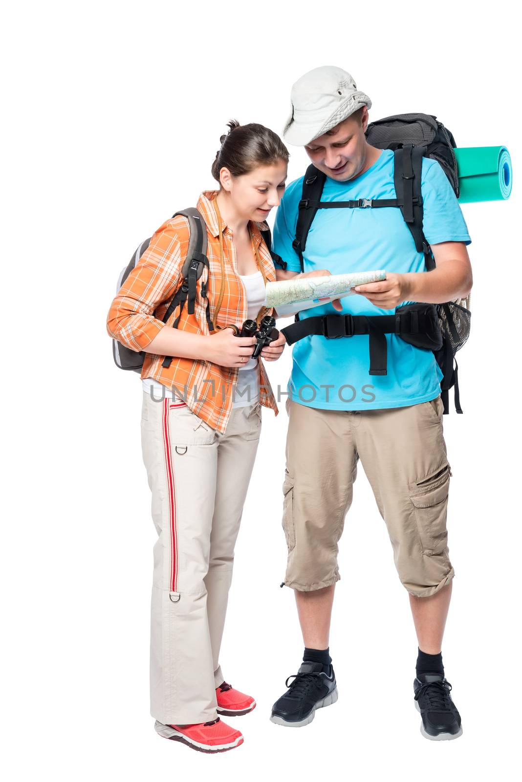 couple travelers with backpacks and map on a white background