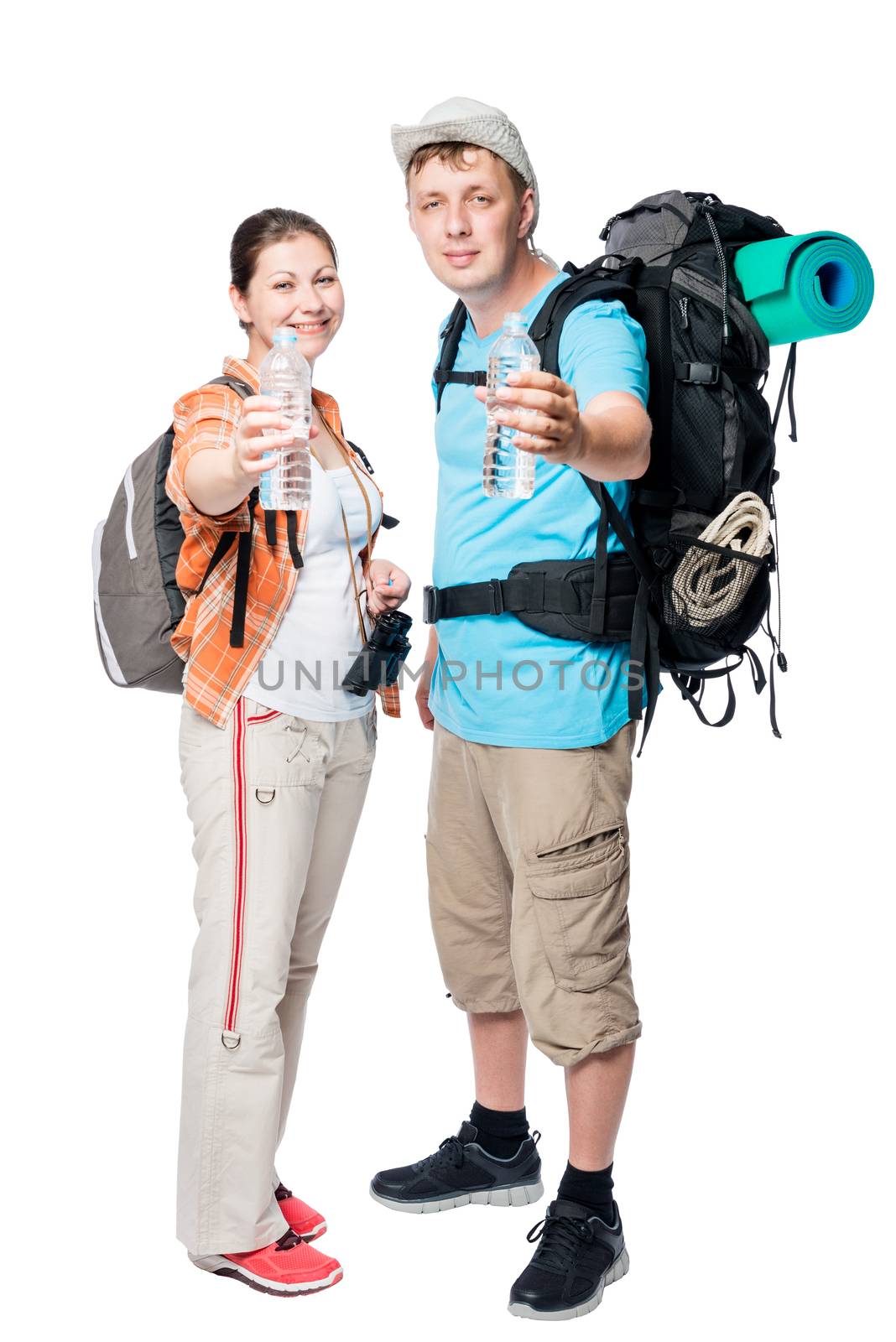 happy tourists with bottles of water on a white background