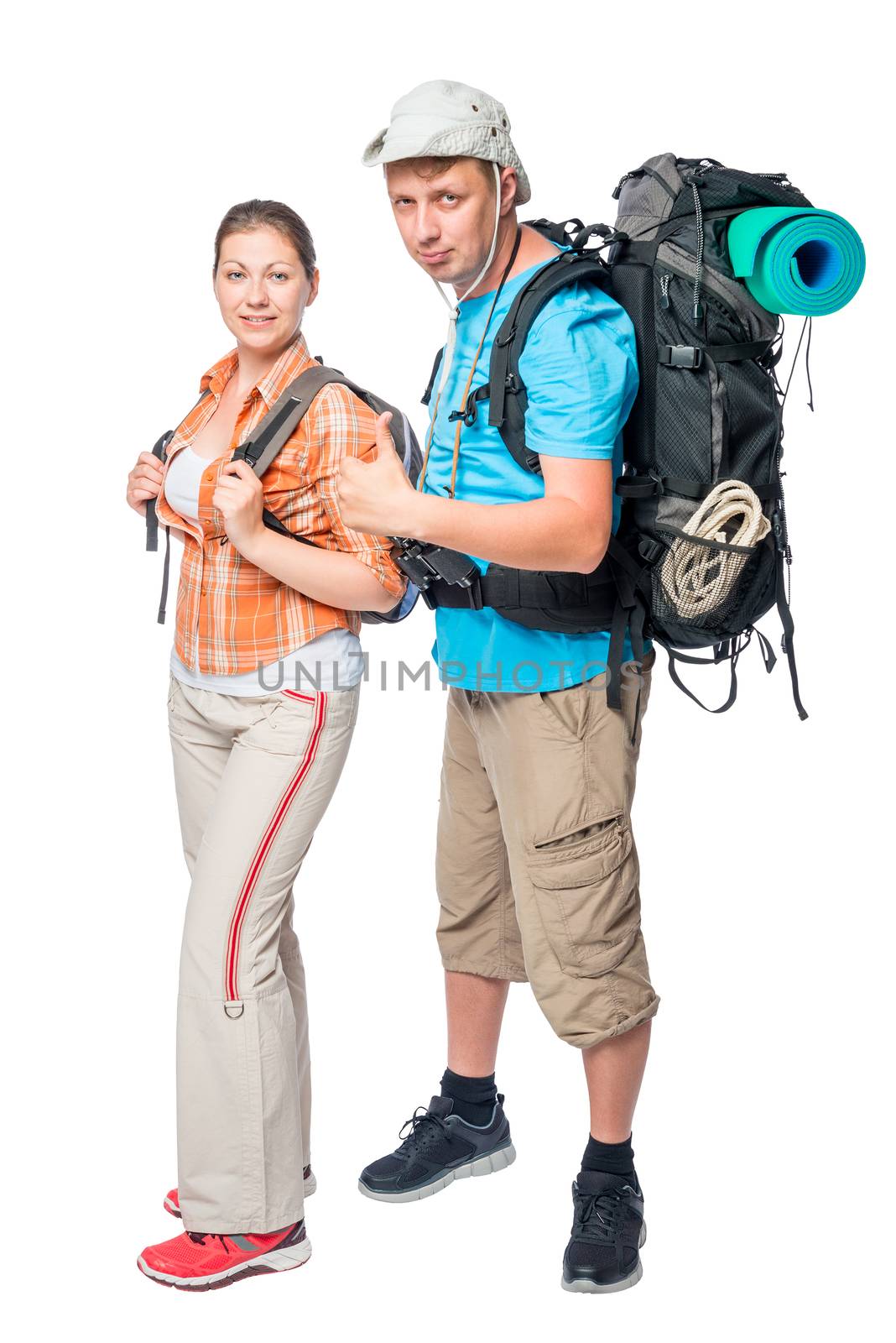 Tourist satisfaction with backpacks posing in the studio on a white background