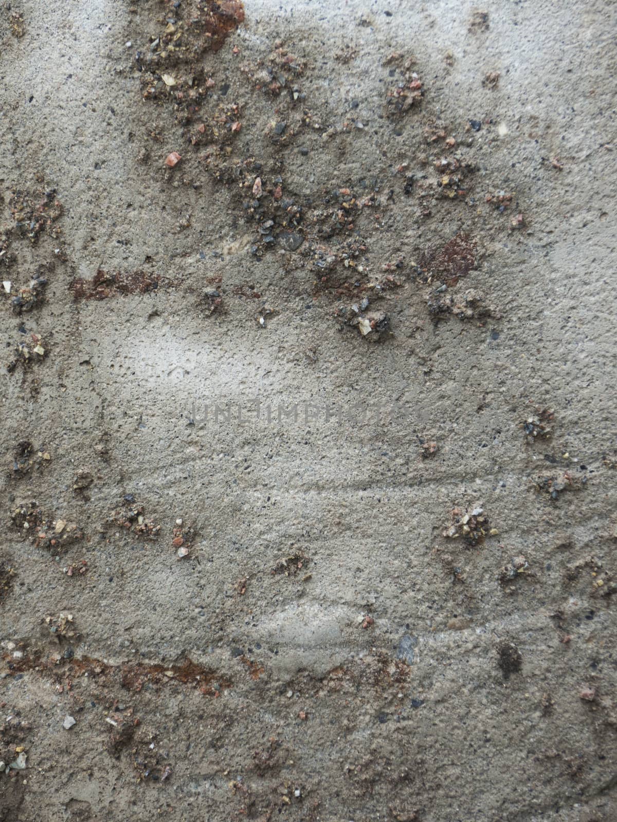 stones and gravels in grey cement