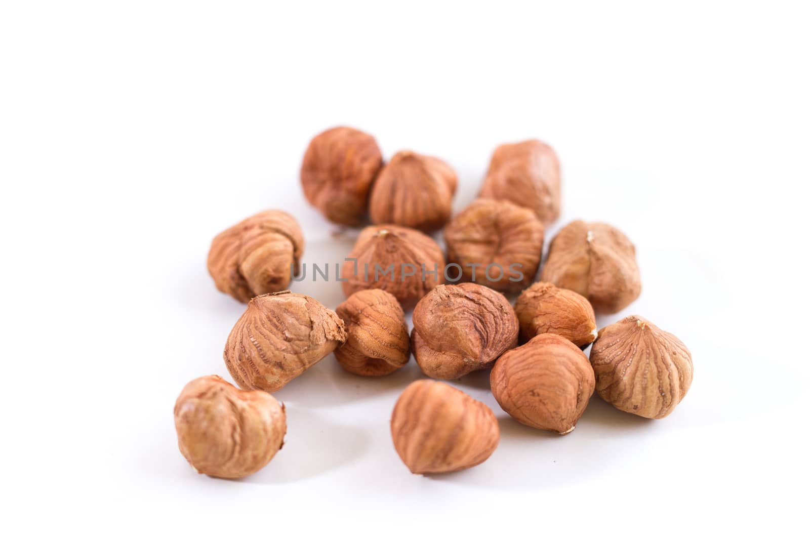 Hazelnuts isolated on white background