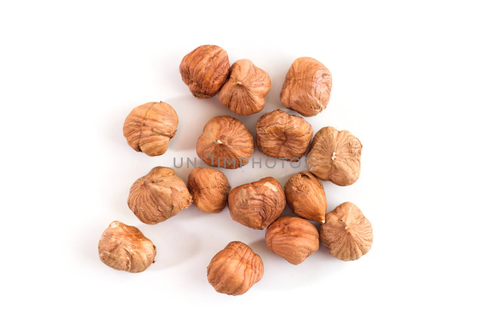 Hazelnuts isolated on white background