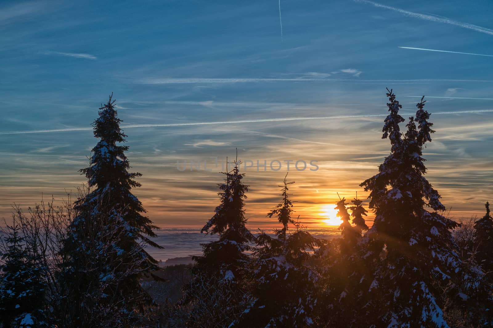 Amazing evening with sunset in Eagle mountains. Beautiful mountain within inversion