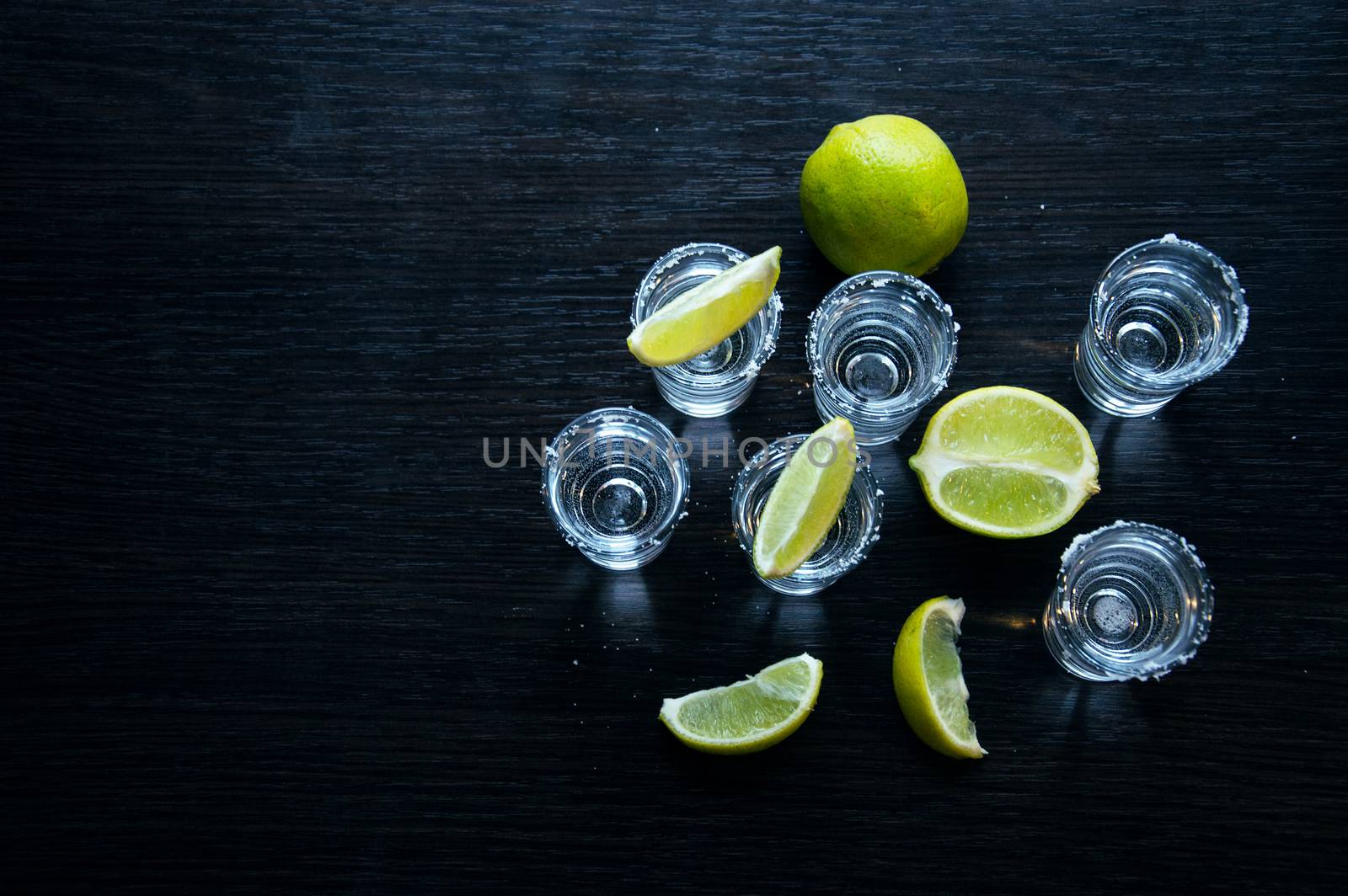 One Silver tequila shots with lime - Traditional Mexican drink