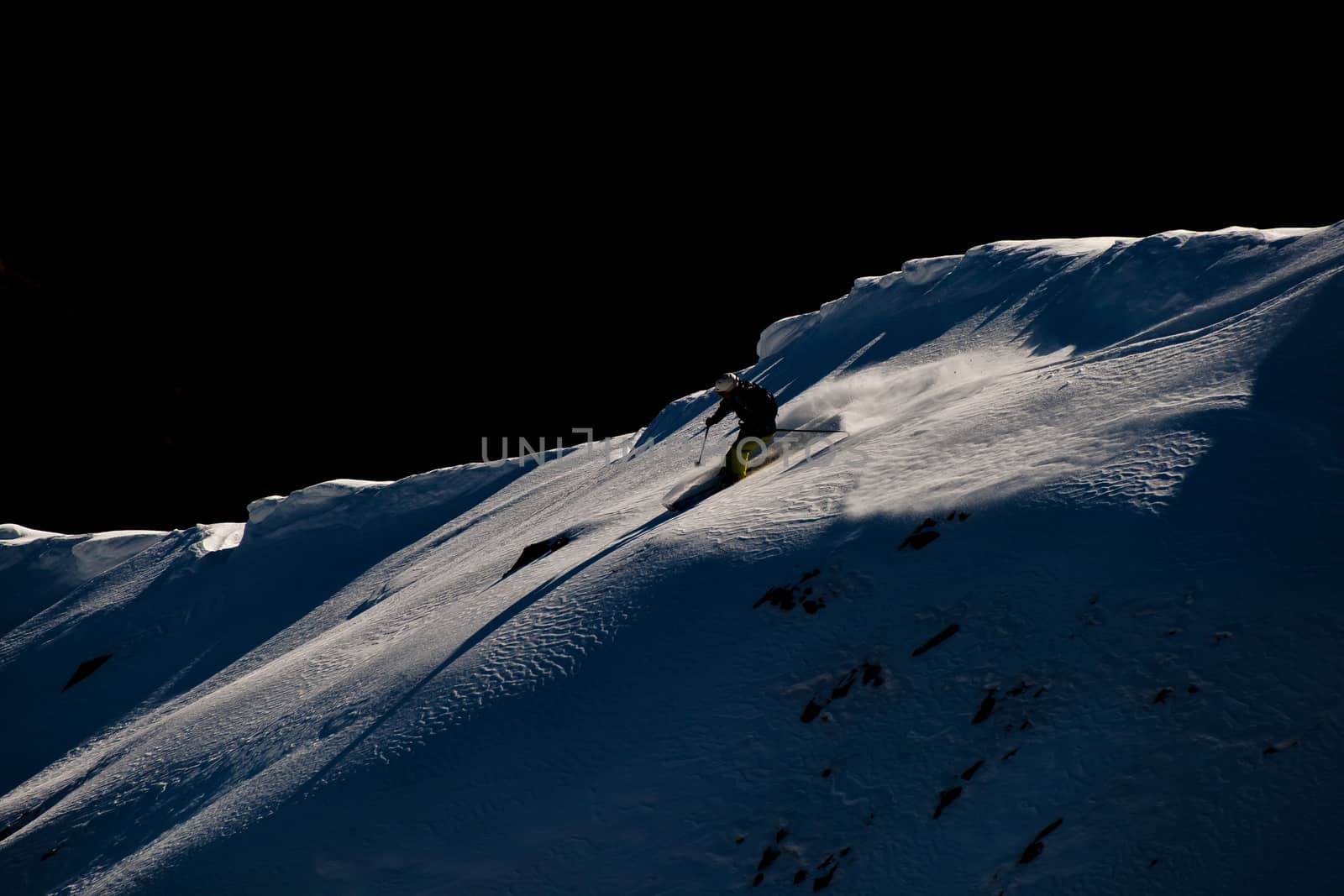 Freerider skiing in the mountains of Siberia