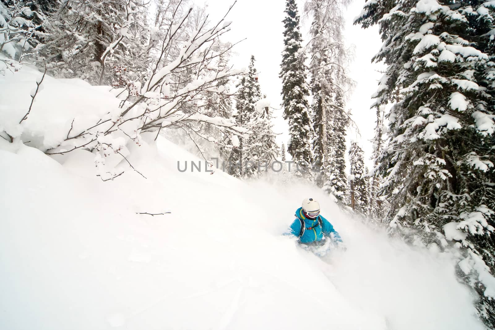 Freerider skiing in the mountains of Siberia