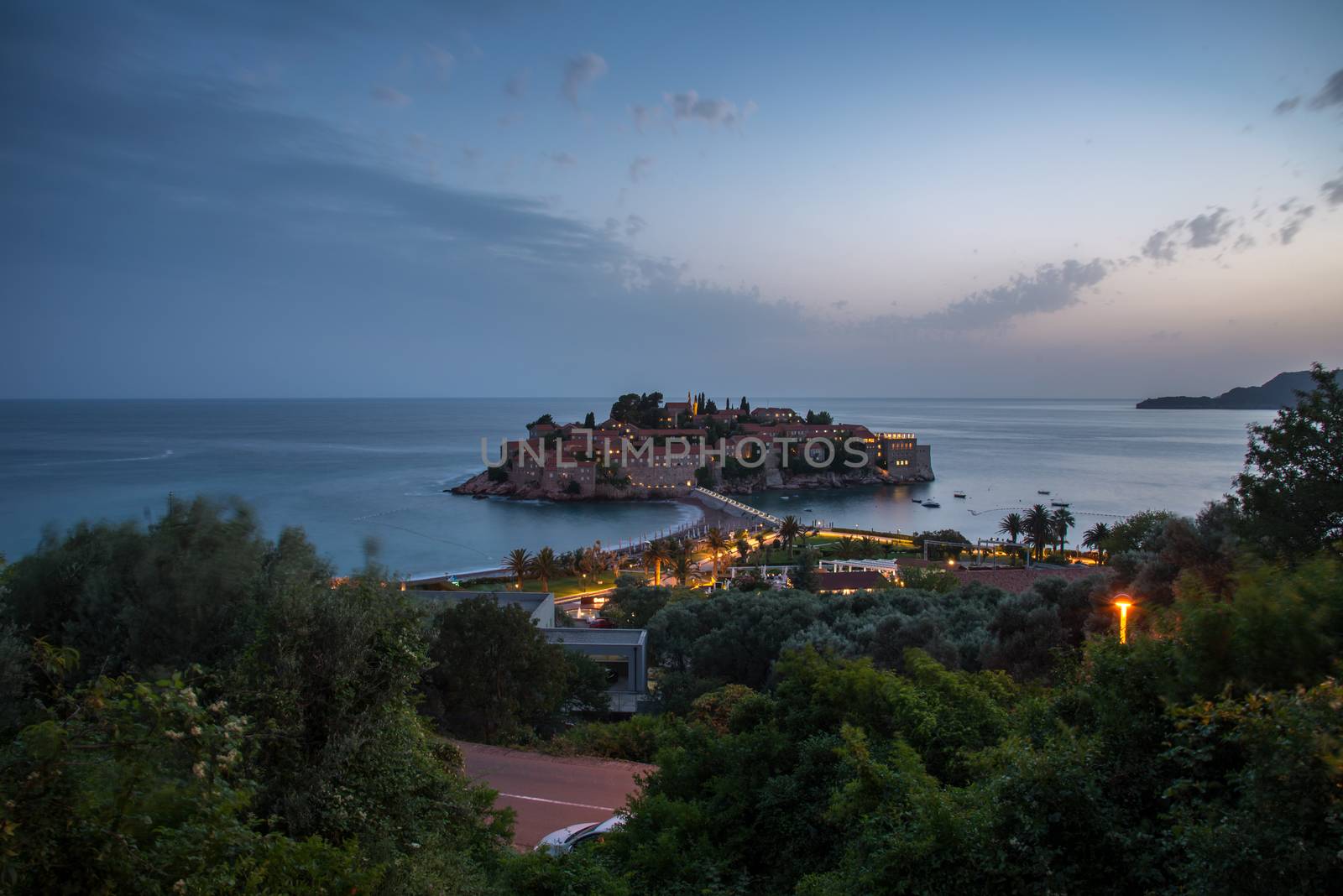 Sveti Stefan in Budva at sunset by vlaru