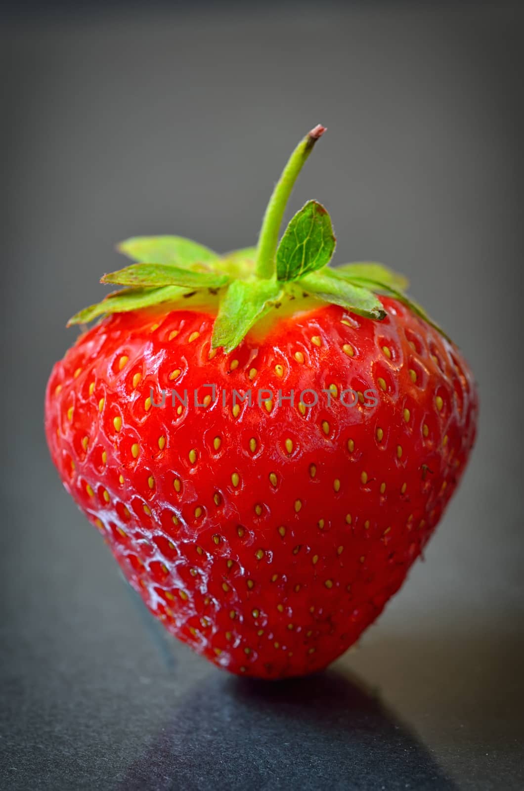 Strawberry fruit isolated on black  background
