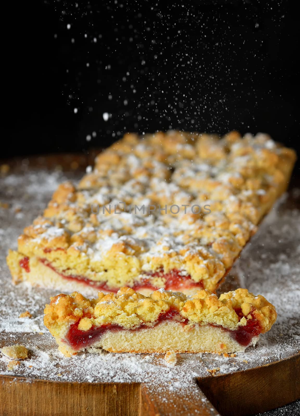 Homemade crumble cherry cake and powder sugar