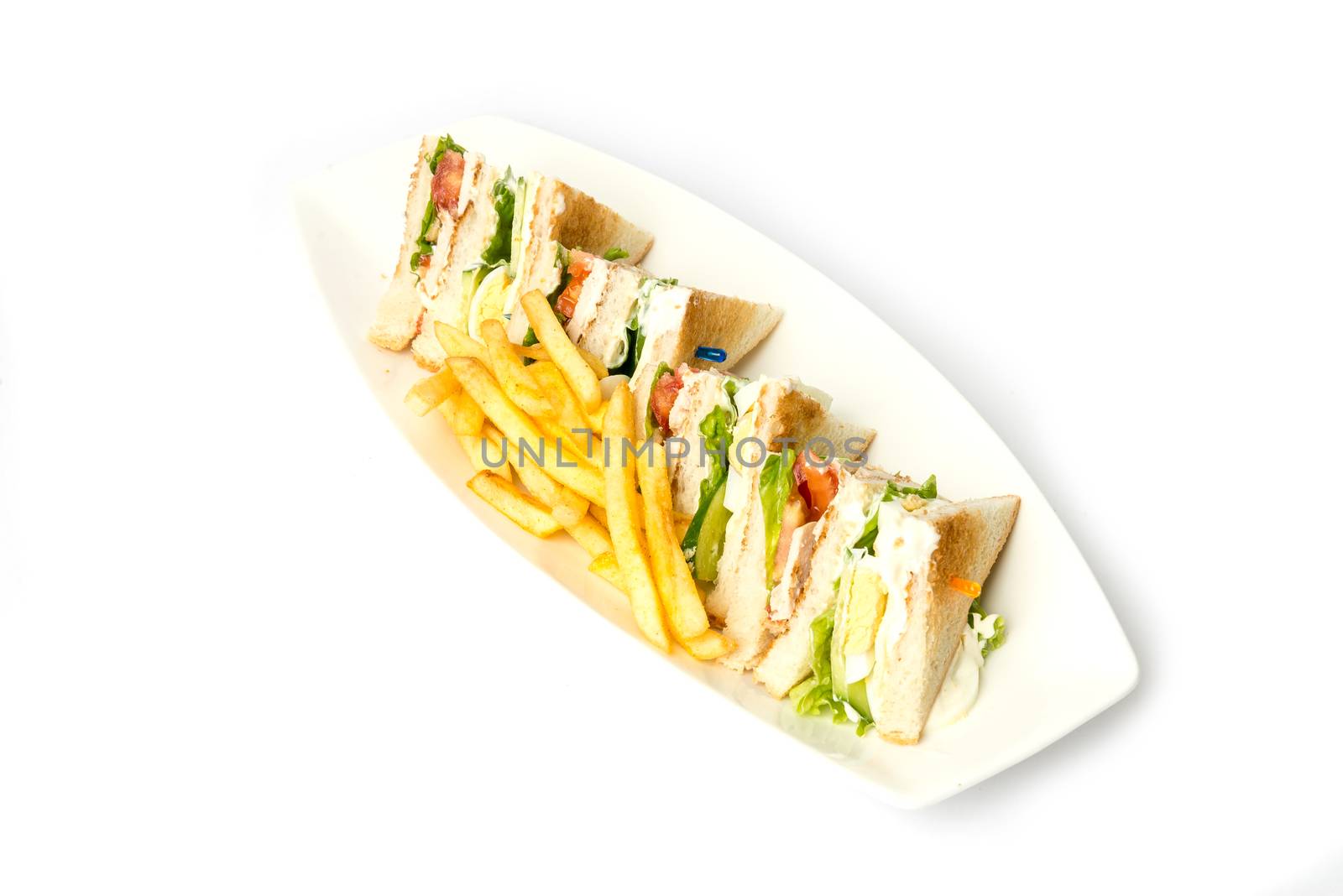 Club Sandwich with Cheese, Pickled Cucumber, Tomato and Smoked Meat. Garnished with French Fries