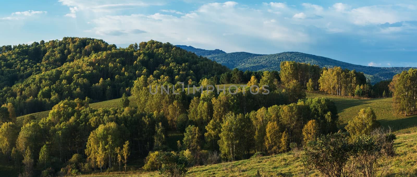 Beauty dawn in the mountains in Altay, panoramic picture