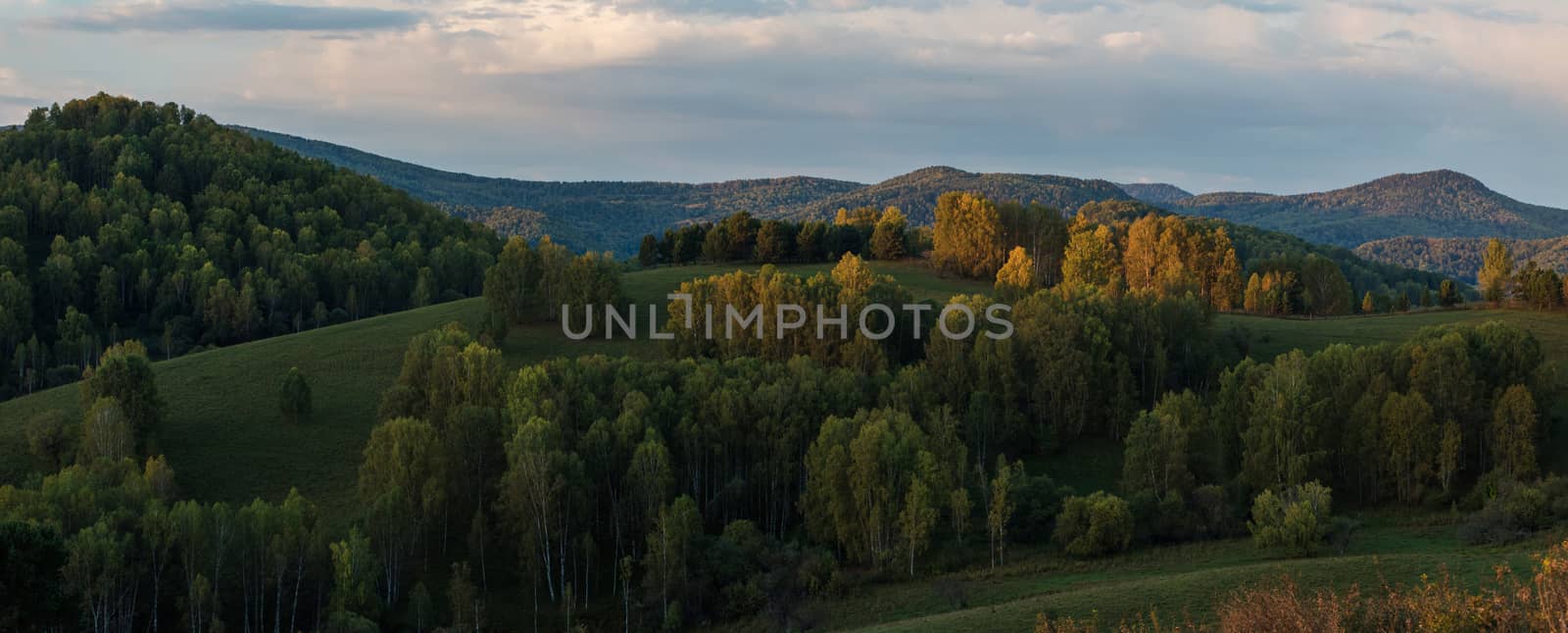 Beauty dawn in the mountains in Altay, panoramic picture