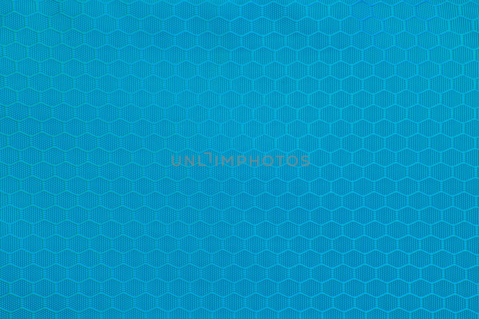 blue honeycomb background texture. Texture background of polyester fabric. Plastic weave fabric pattern
