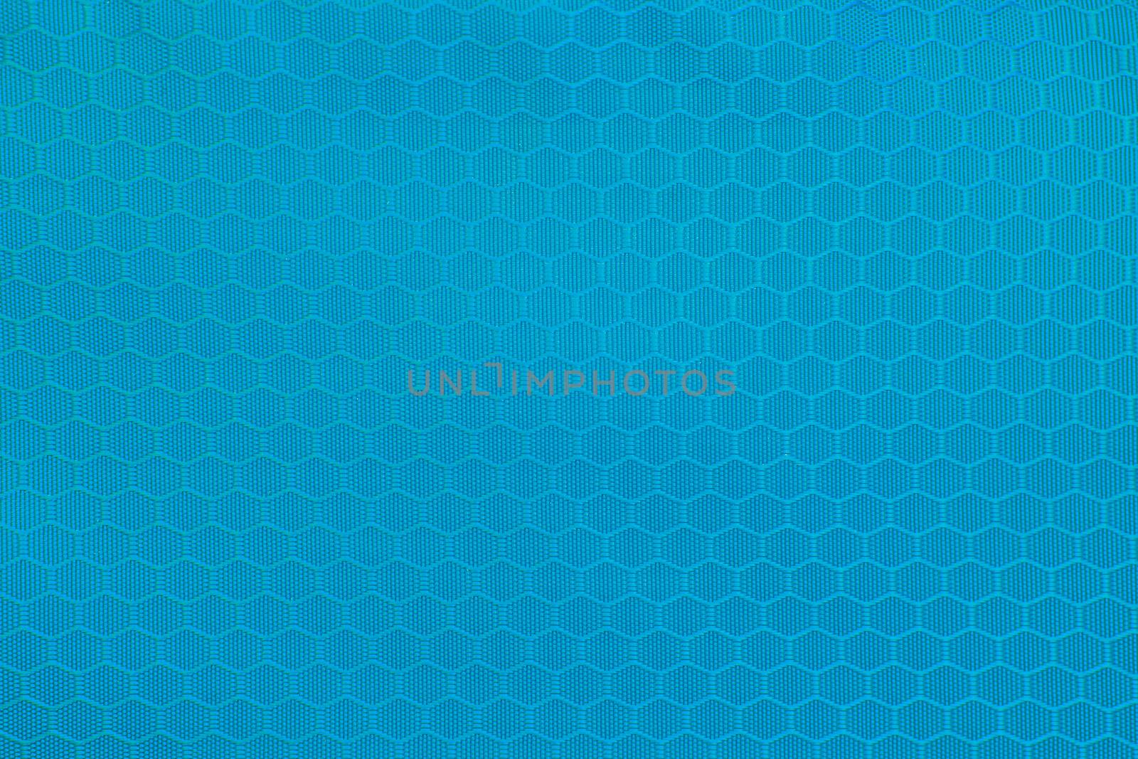 blue honeycomb background texture. Texture background of polyester fabric. Plastic weave fabric pattern