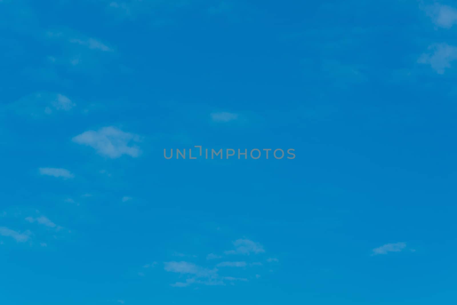 Fantastically beautiful white clouds against a blue sky.