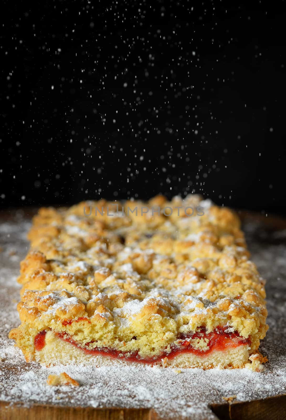 Homemade crumble cherry cake and powder sugar